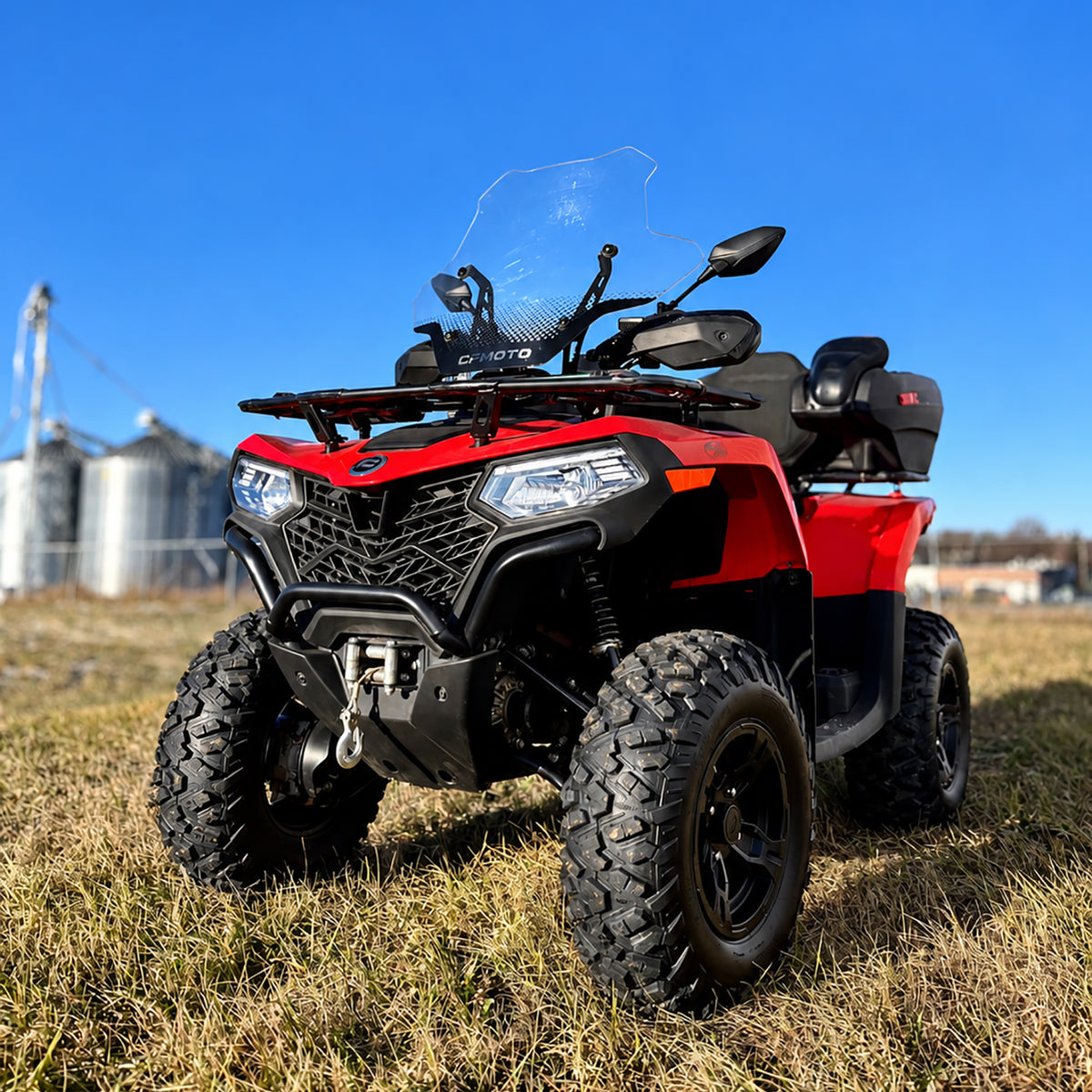 CFMOTO CForce 400 Touring ATV equipped with a PERFEX 1.5-inch lift kit for increased ground clearance and a taller stance.