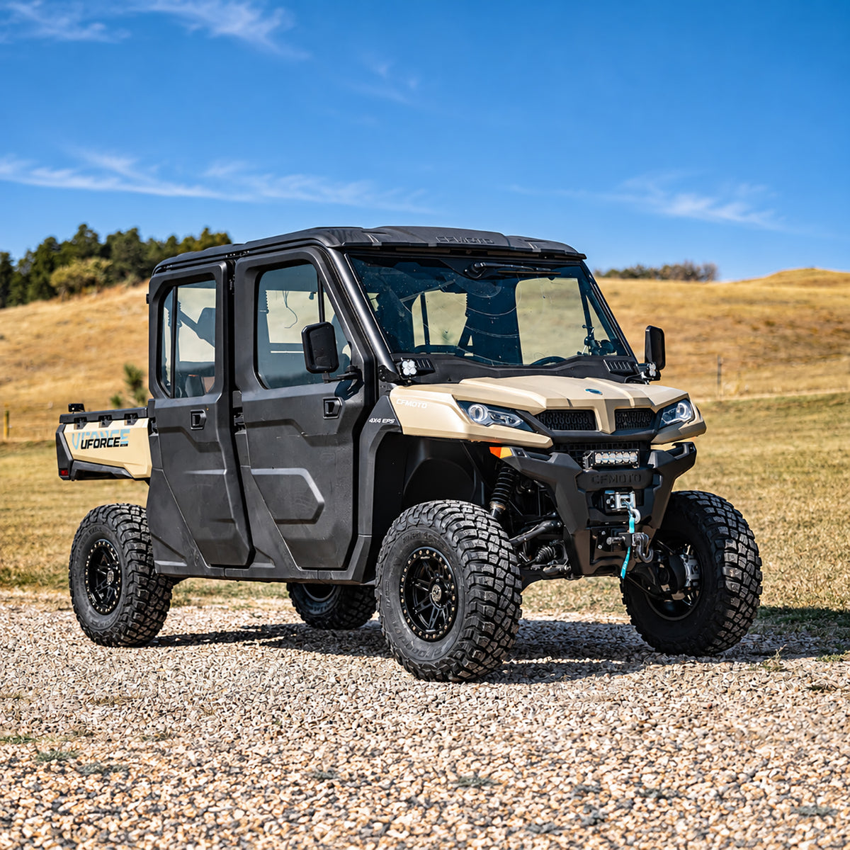 CFMOTO UForce 1000 XL with a PERFEX 2-inch lift kit, shown from a front three-quarter angle with 30" off-road tires.