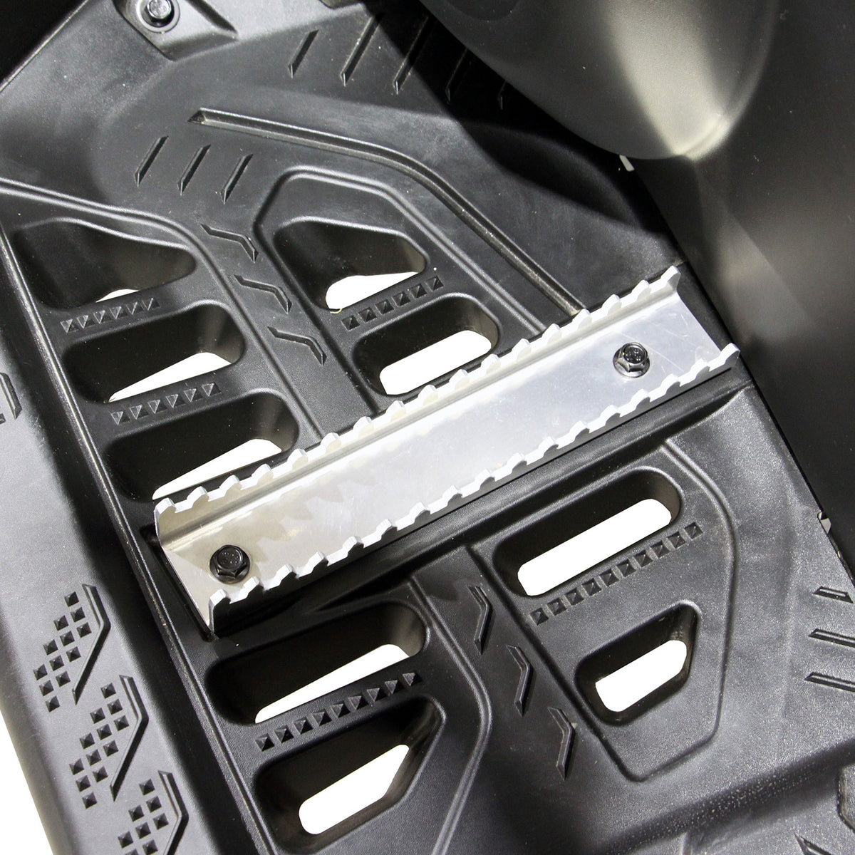 Close-up of PERFEX left aluminum foot peg on a Can-Am Outlander G3 1000R XT-P ATV, highlighting the 20° angled sides for superior traction.