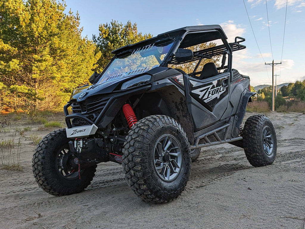 Perfex lift-kitted CFMoto ZForce G2 Sport 950. UTV navigating through mud during a ride. The image highlights the beauty and quality of the Perfex product.