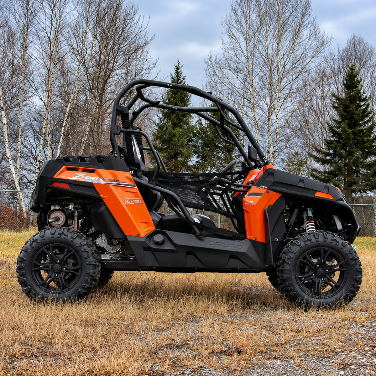 Side profile of a lifted CFMOTO ZForce 500 Trail showing its raised stance and off-road tires.