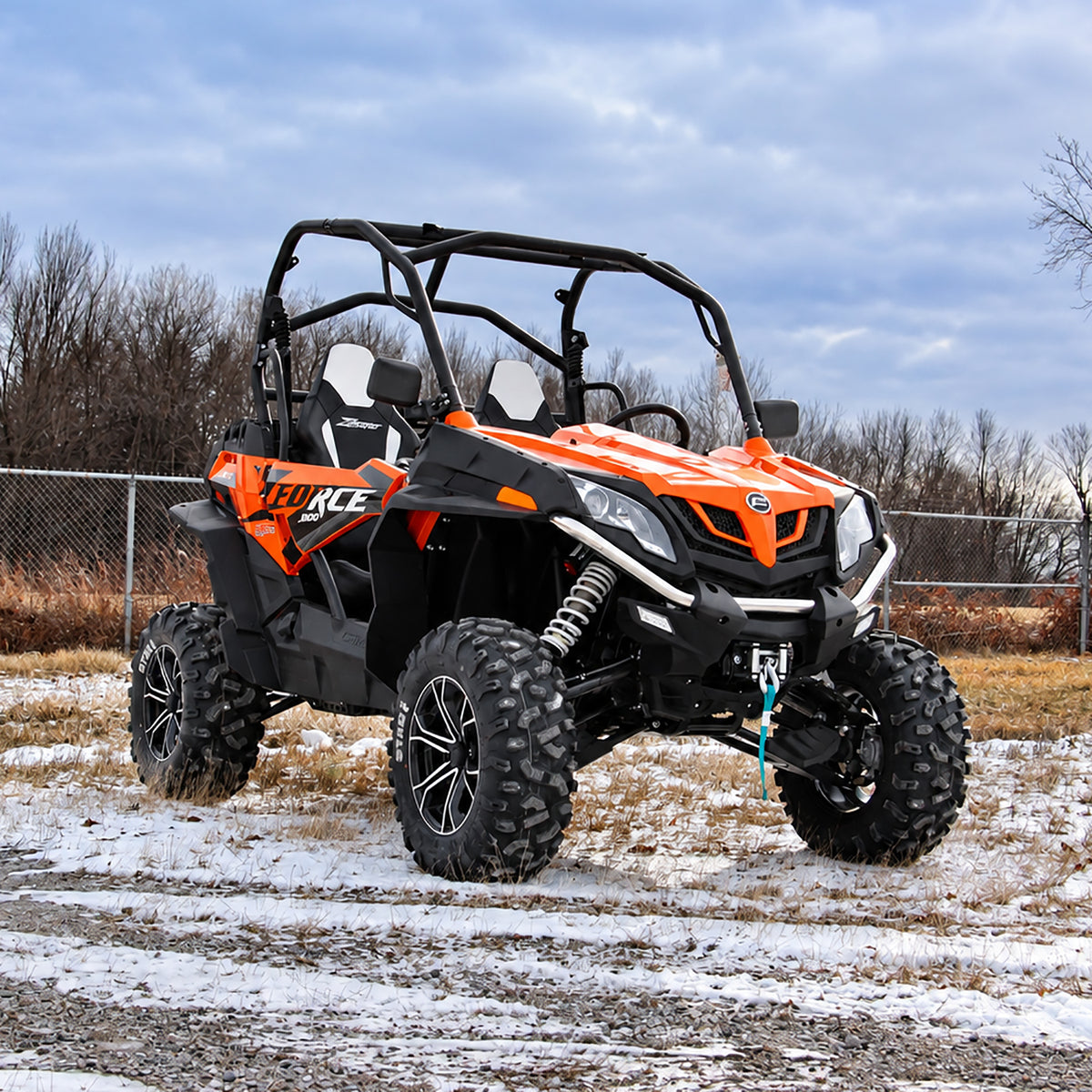 Lifted CFMOTO ZForce 1000 with PERFEX 2" lift kit, showing its front suspension and raised stance.