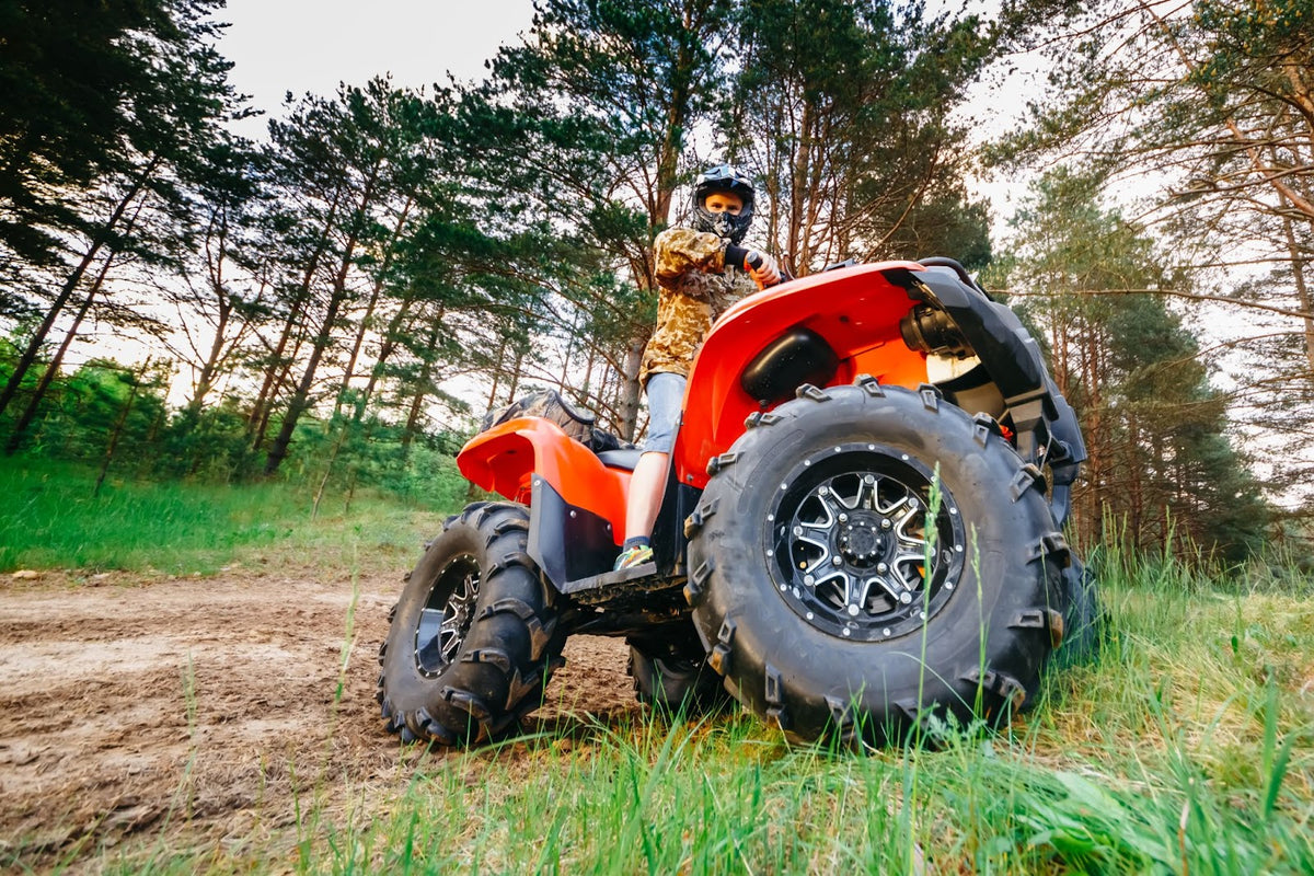 What are the pros and cons of an ATV lift kit? PERFEX Industries