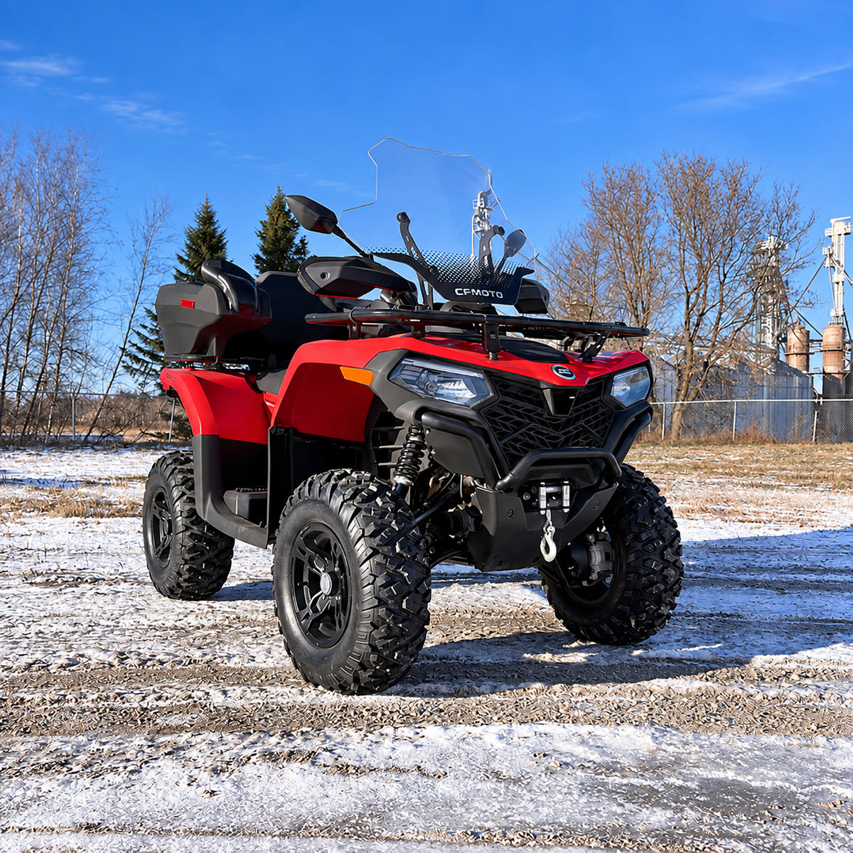 Front three-quarter view of a CFMOTO CForce 400 Touring with PERFEX 1.5" lift kit and increased ground clearance.