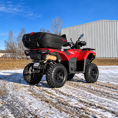 Rear three-quarter view of a lifted CFMOTO CForce 400 Touring ATV equipped with the PERFEX 1.5" lift kit.