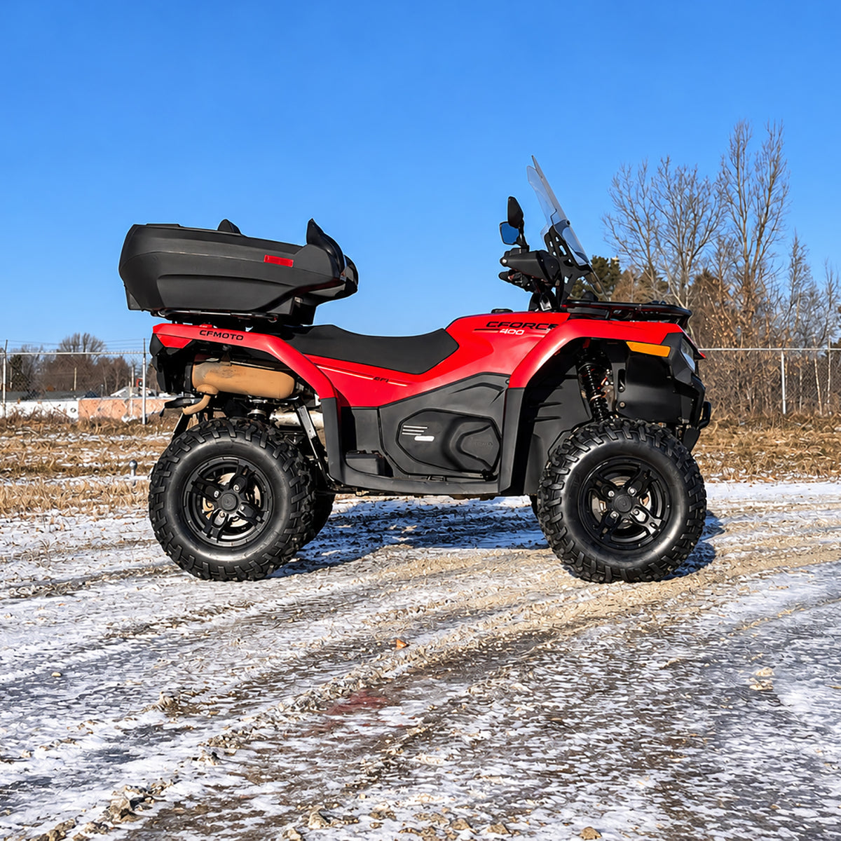 Side profile of a CFMOTO CForce 400 Touring ATV showing its stance with the PERFEX 1.5-inch lift kit installed.