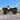 Side view of a Can-Am Outlander 700 PRO with PERFEX 1-inch lift kit installed, showing increased ground clearance.