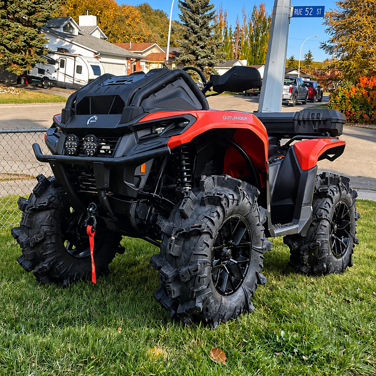 Can-Am Outlander X MR 700 with PERFEX 1-inch lift kit installed, featuring mud tires and increased ground clearance.