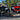 Front comparison of two CFMOTO CForce 600 ATVs showing differences in ride height and stance.