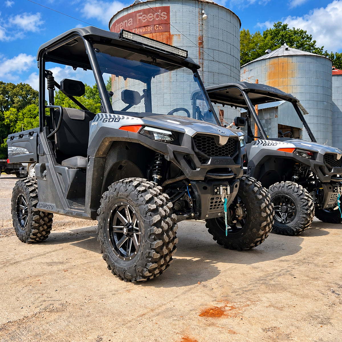 CFMOTO UForce 600 with PERFEX 2.5-inch lift kit installed outdoors.