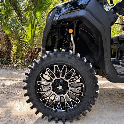 Close-up of front left 33-inch System3 XT400 tire and 20-inch MSA wheel on lifted CFMOTO UForce U10 XL PRO with PERFEX 2.5in UTV lift kit.