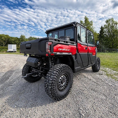 2025 CFMOTO UForce U10 XL Pro Highland with PERFEX 2.5in lift kit and System3 RC500 32” tires on 15-inch wheels — red UTV with enhanced ground clearance and lighting setup.