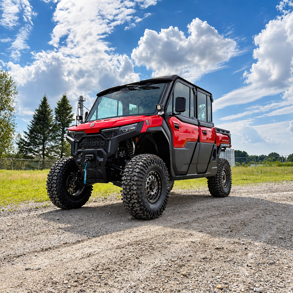 Side view of red 2025 CFMOTO UForce U10 XL Pro Highland featuring PERFEX UTV lift kit and 32x10R15 System3 RC500 tires — built for rugged terrain.