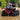 Front view of a Can-Am Renegade X MR 650 with PERFEX 2-inch lift kit and aggressive mud tires riding through deep water.
