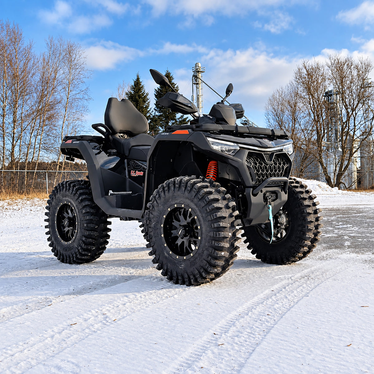 Front angle view of a lifted CFMOTO CForce 1000 Touring on 30-inch System 3 XT400 tires, showing its increased stance and ground clearance.