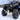 Front three-quarter view of a Yamaha Kodiak 450 ATV equipped with a PERFEX 2-inch lift kit, showing its lifted stance and front ground clearance.