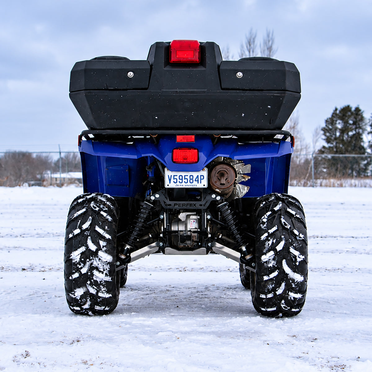 Rear view of a lifted Yamaha Kodiak 450 ATV showing the PERFEX 2-inch lift kit, rear suspension and increased ground clearance.