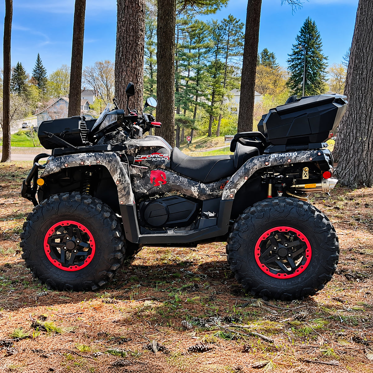 Side profile of a CFMOTO CForce 1000 with PERFEX suspension lift, featuring large off-road tires and a raised stance.