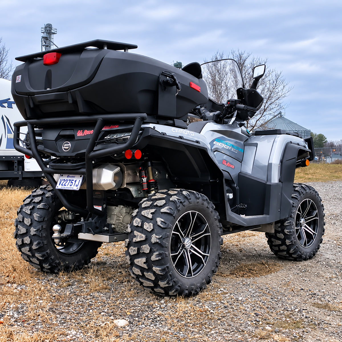 Rear three-quarter view of a lifted CFMOTO CForce 800XC ATV featuring a PERFEX 2-inch suspension upgrade.