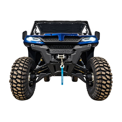 Low front view of a CFMOTO UForce 1000 XL with a PERFEX 2-inch lift kit, showcasing its front suspension, 32s tires and raised ground clearance.