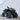 2025 CFMoto CForce 1000 Touring with PERFEX 2-inch lift kit installed, parked in a rugged terrain setting, emphasizing the significant clearance and aggressive look provided by the 30-inch tires.