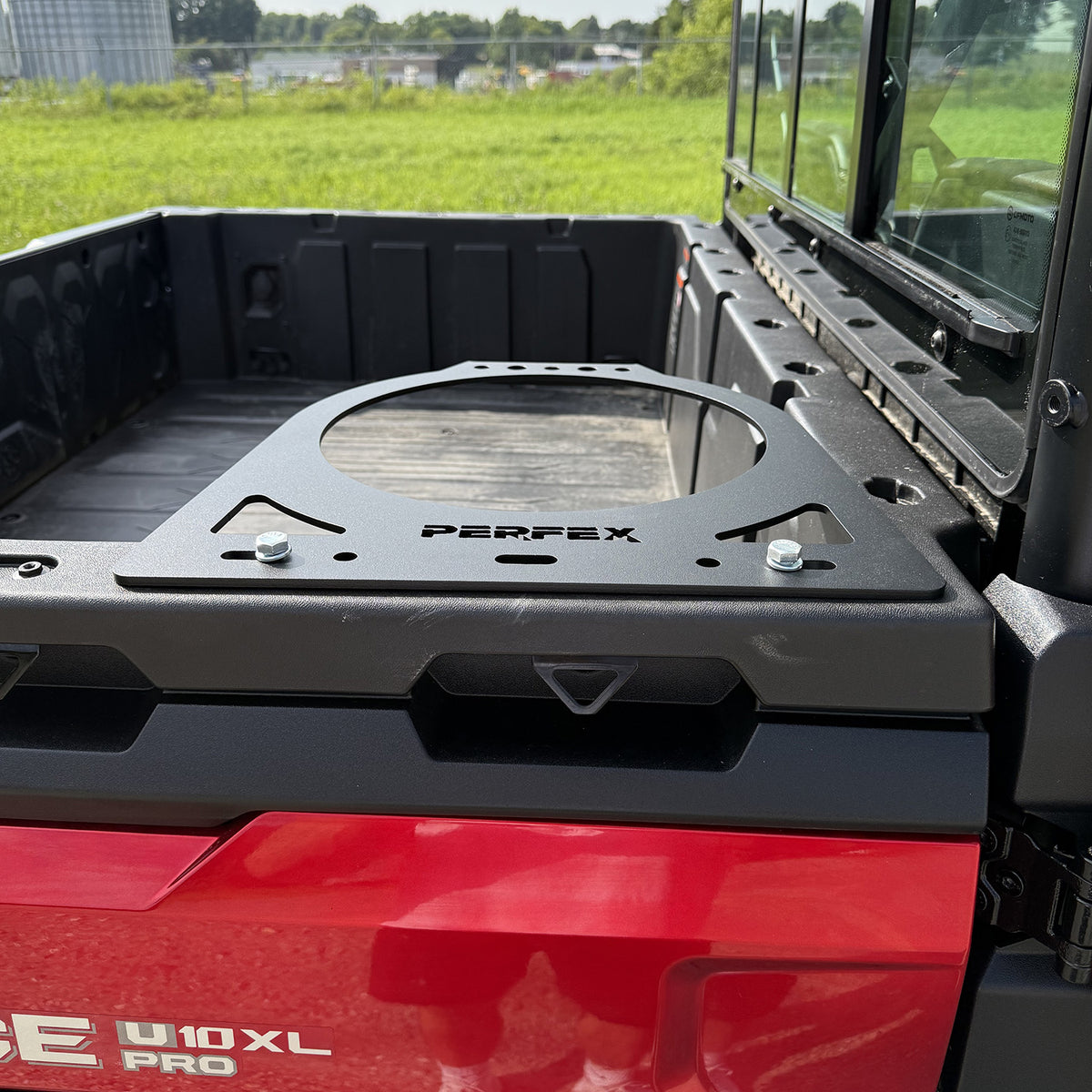 PERFEX™ 5-gallon bucket holder installed on CFMoto UForce U10 XL PRO Highland using included anchors and hardware