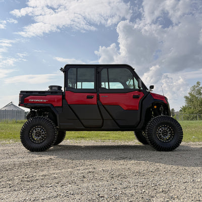 "CFMoto UForce U10 XL Pro Highland in red with PERFEX 2.5in UTV lift kit and 32-inch System3 RC500 tires — aggressive off-road stance with visible cube lights
