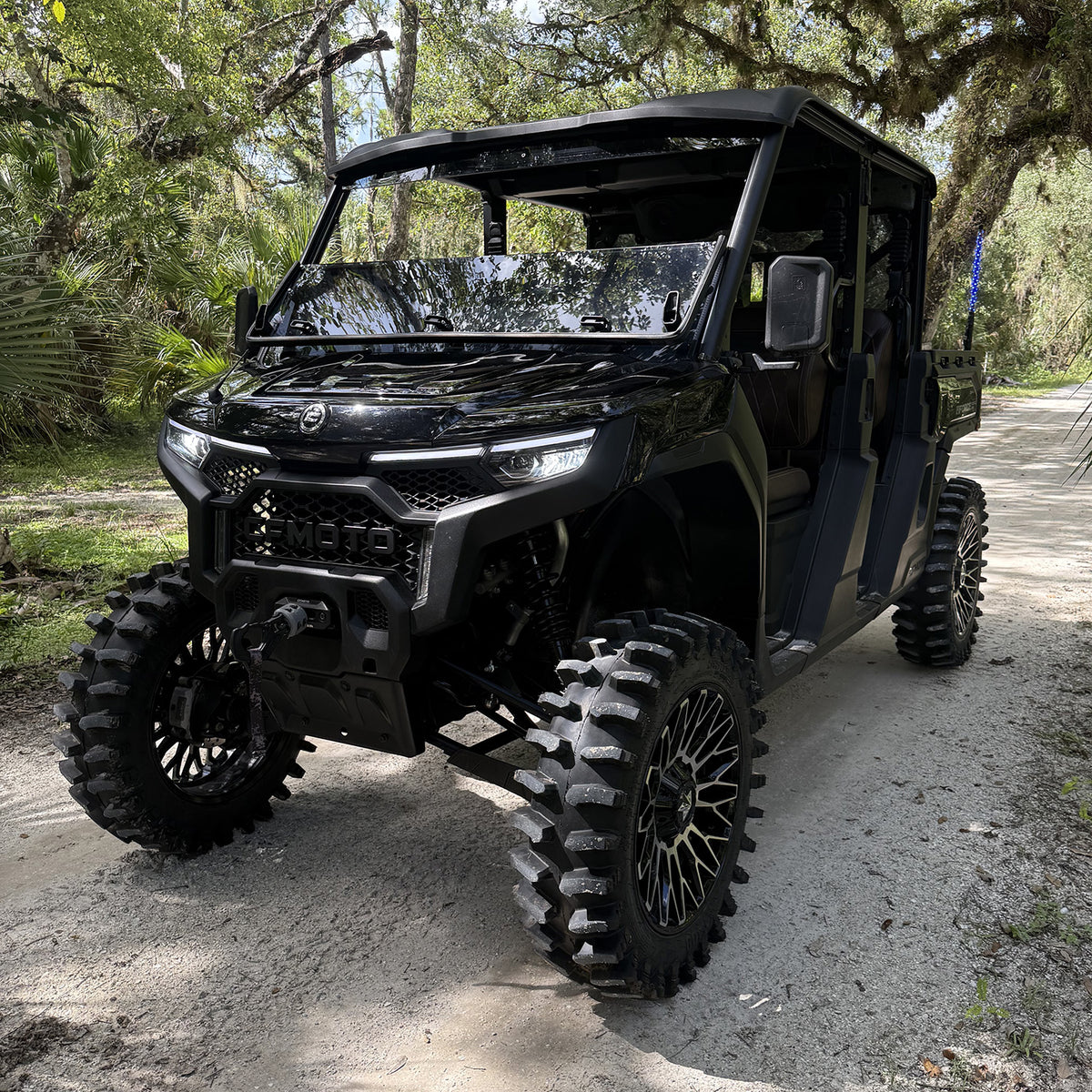 U10 lifted black on black CFMoto UForce U10 XL PRO with PERFEX 2.5-inch UTV accessory lift kit, equipped with 33in System3 XT400 tires and MSA 20in wheels