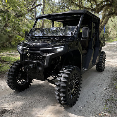 U10 lifted black on black CFMoto UForce U10 XL PRO with PERFEX 2.5-inch UTV accessory lift kit, equipped with 33in System3 XT400 tires and MSA 20in wheels