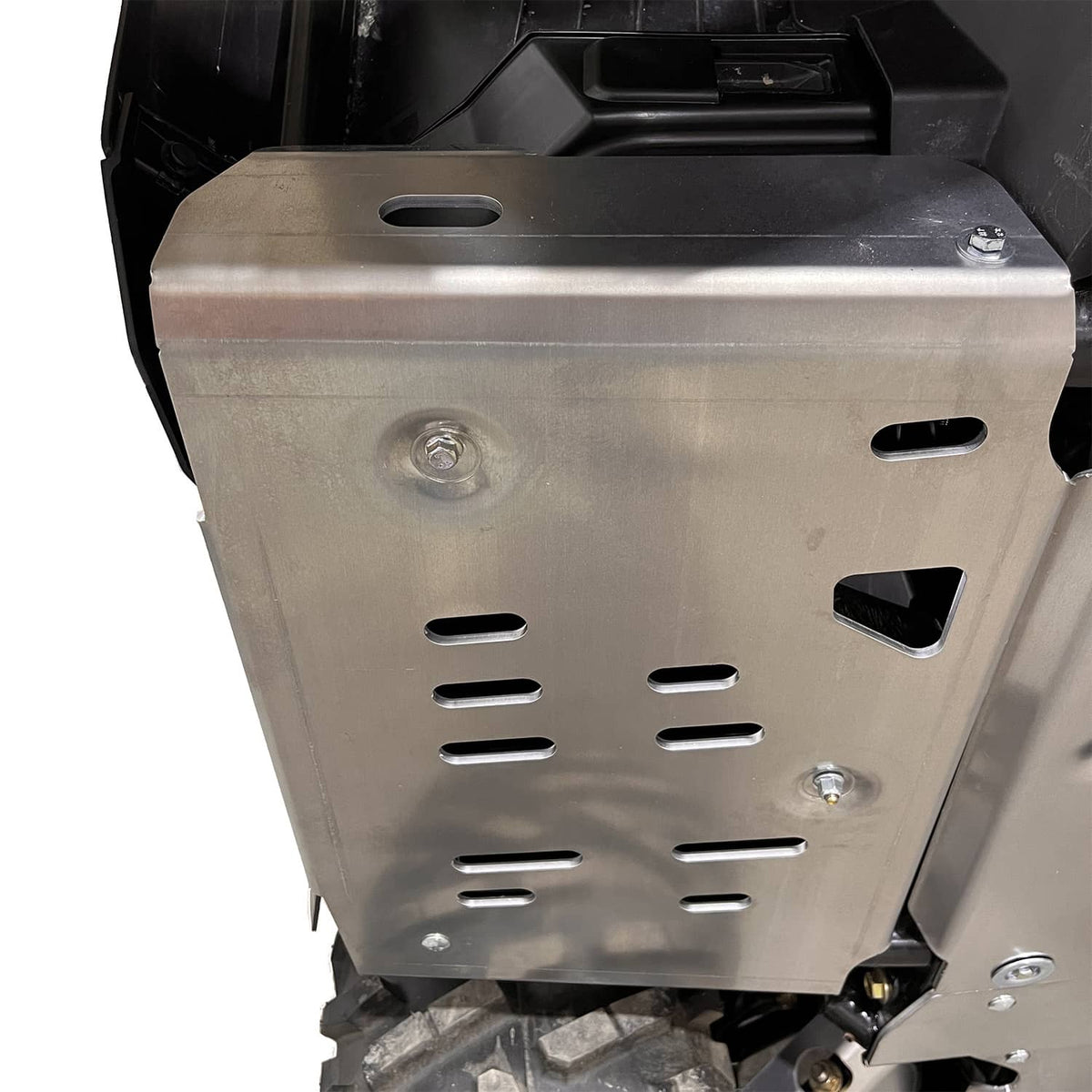White background image of a Can-Am Outlander PRO, focusing on the PERFEX Industries footwell plate for superior ATV protection. Ideal for off-road adventures.