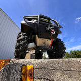 Front view of PERFEX Industries durable 3/16" aluminum skid plate with a 2-inch lift kit on a 2023 Kawasaki Brute Force 750, enhancing ATV off-road performance.