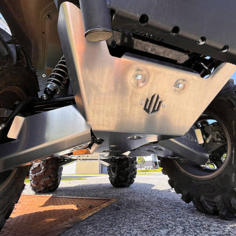 Front view of PERFEX Industries skid plate made from 3/16" aluminum on a 2023 Kawasaki Brute Force 750, designed for maximum ATV protection and durability off-road.