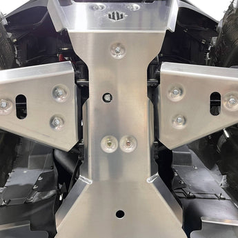 Close-up view of PERFEX Industries 3/16" heavy-duty aluminum 5052 central skid plate and front a-arm guards, providing robust protection for Kawasaki Brute Force ATVs during off-road adventures.