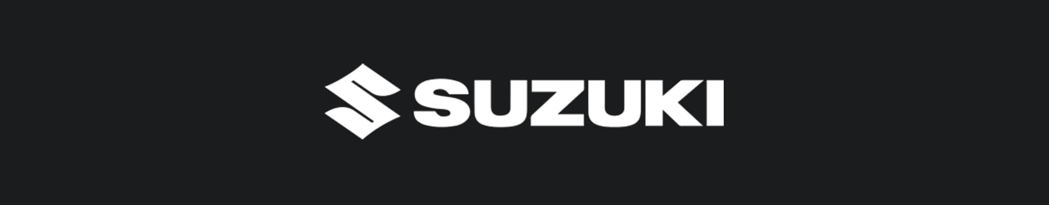 The Suzuki logo in white on a black background, featured alongside the text on the Perfex website.