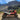 Present on the 'About Us' page, the image showcases a Honda Talon 1000 X-4 UTV in the sand in front of a large mountain. A testament to how our products can go wherever you desire.