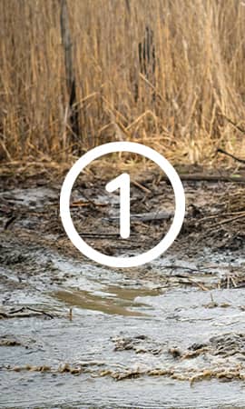 Featured on the 'Become Affiliate' page, the image depicts the number 1 in the center, representing the first step out of 4 to become an affiliate with Perfex. The photo showcases mud in a field.