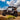 UTV featuring a Perfex lift kit, used on the 'Become a Dealer' page. The image shows the UTV atop a mountain.