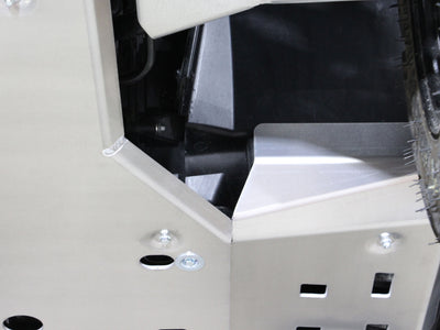 PERFEX aluminum footwell skid plate with raised front section protecting the rider from debris on a Can-Am Outlander MAX 6x6 1000R G2 ATV