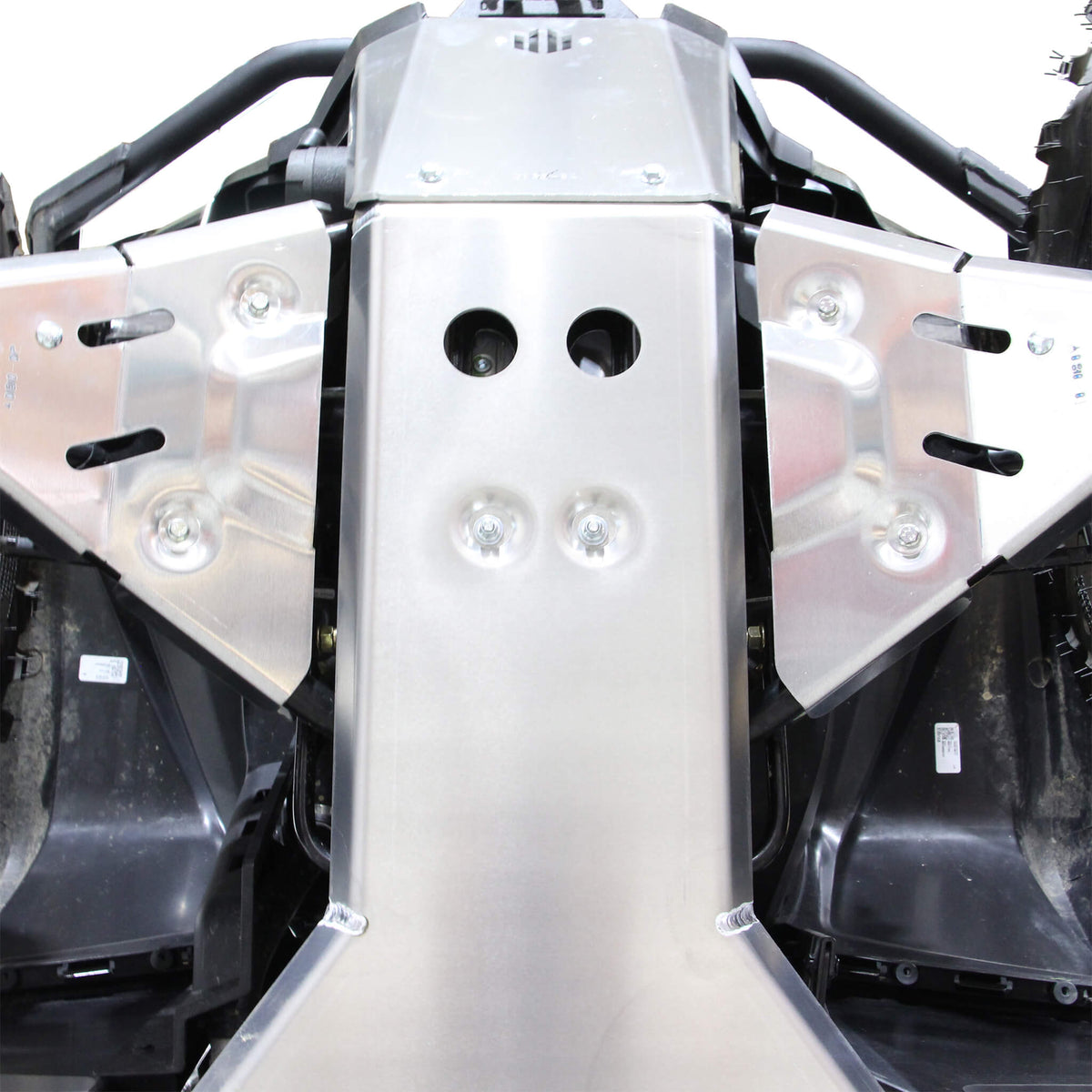 PERFEX aluminum front skid plate with recessed bolt holes and logo protecting the front suspension of a Can-Am Outlander MAX 6x6 450 G2L ATV