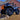 ATV parked beside a house, showcasing a lift kit purchased from Perfex.