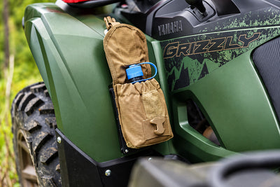 Yamaha Grizzly 700 left front fender with Project Backcountry Modular FenderLink MOLLE Panel and storage pouch attached.