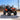CFMOTO CForce 600 Touring with PERFEX suspension lift, shown from a front three-quarter angle.