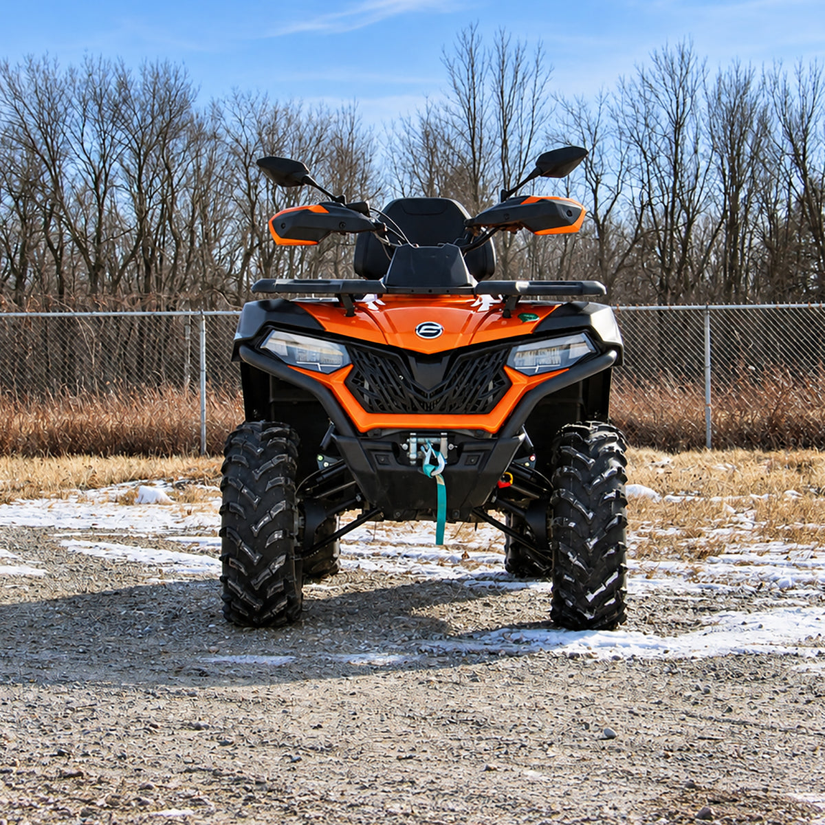 Front view of a CFMOTO CForce 600 Touring ATV equipped with a PERFEX 1.5" lift kit.