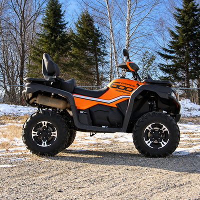 Side profile of a lifted CFMOTO CForce 600 Touring showing its raised stance and off-road tires.