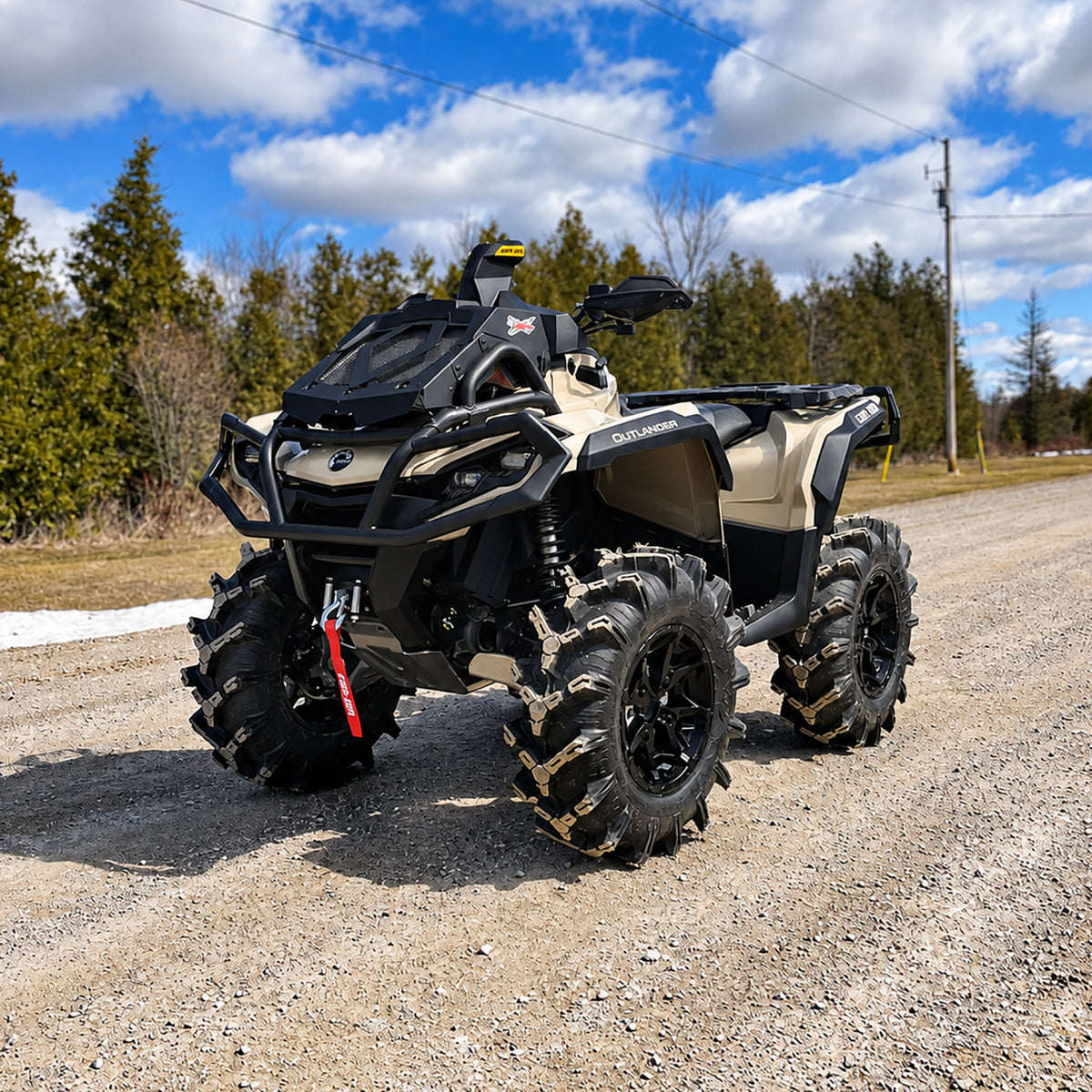 Front three-quarter view of a Can-Am Outlander X MR 850 with PERFEX 2" lift kit and aggressive off-road stance.