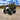 Rear three-quarter view of a Can-Am Outlander X MR 850 equipped with a PERFEX 2" lift kit and mud tires.