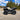 Side view of a Can-Am Outlander X MR 850 showing the raised stance and ground clearance with a PERFEX 2-inch lift kit.