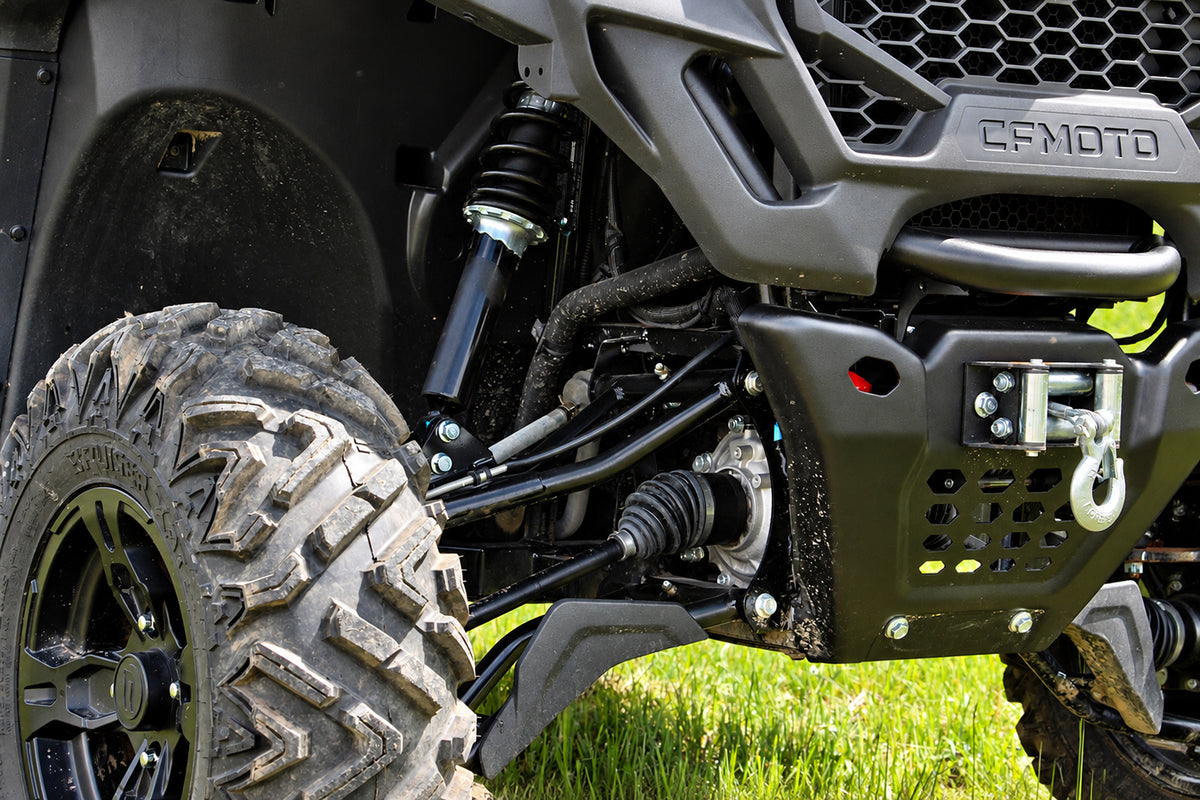 Front suspension of a CFMOTO UForce 600 with the PERFEX 2-inch lift kit installed.