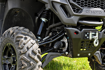 Front suspension of a CFMOTO UForce 600 with the PERFEX 2-inch lift kit installed.