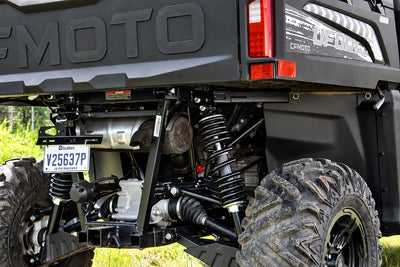 Rear suspension of a CFMOTO UForce 600 with the PERFEX 2-inch lift kit installed.